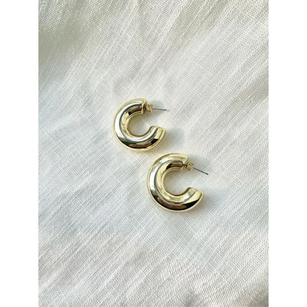 Minimalistic gold modern sleek hoops